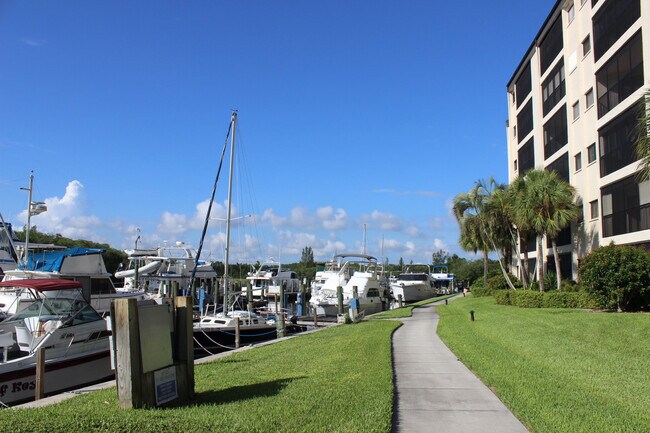 Building Photo - 2/2 Condo with Marina and River Views-Includes cable and water