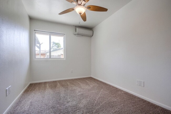 Building Photo - Charming 2BR Home with Attached Garage, Private Patio and a Friendly Community!