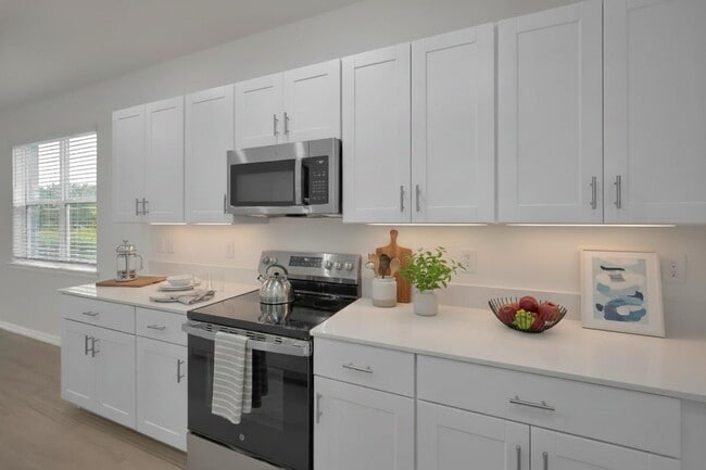 Building Photo - Beautifully Designed Villa in Angeline – Modern, Easy Florida Living