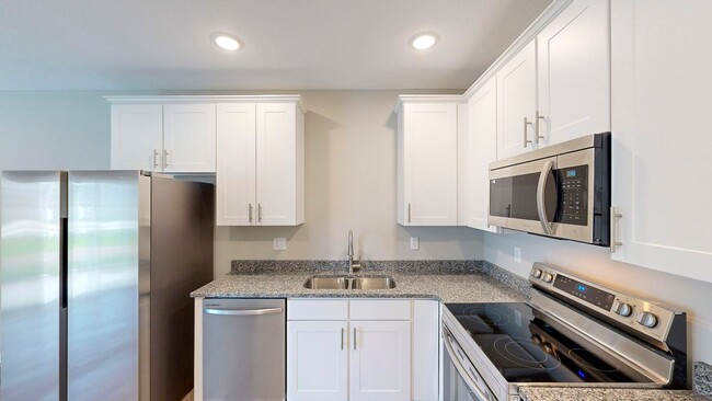 Building Photo - 3 bedroom Townhome Newly Constructed