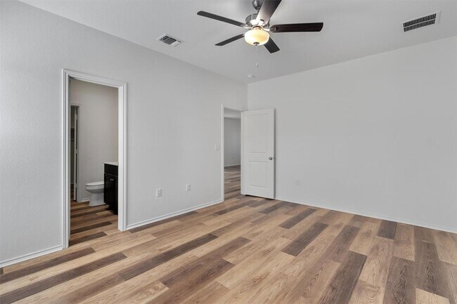 Building Photo - 7704 Poppy Petal Dr