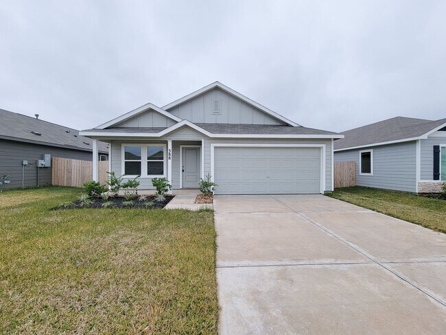 Building Photo - This lovely single-level home showcases a spacious open floorplan shared between the kitchen, din...