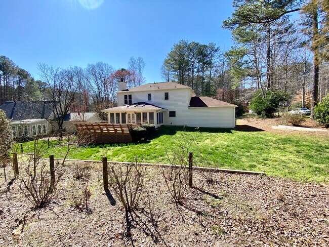 View of the back yard to the large deck - 2160 Heritage Trace Ln