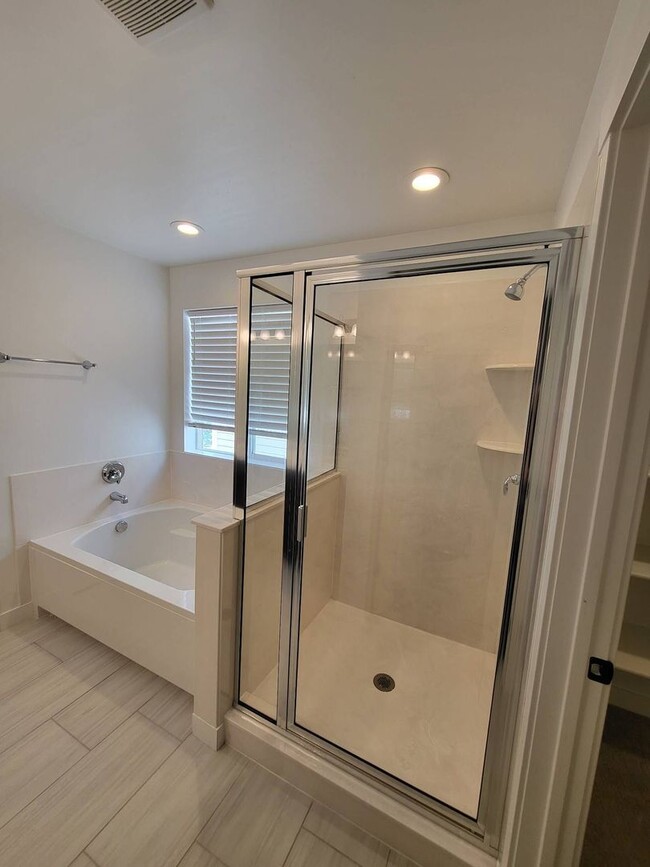 Building Photo - Pet Friendly Gorgeous Row End Townhome w 2 car attached garage!