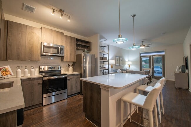 Eat-In Kitchen with Breakfast Bar - Ballpark Apartments @ Town Madison