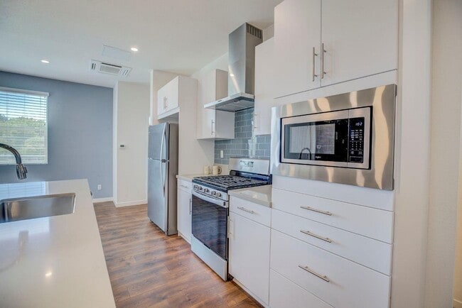Building Photo - Modern Living at The MIll Gorgeous 2bed/2....