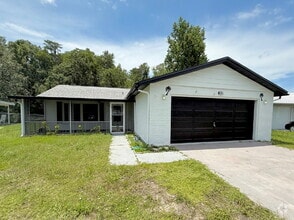 Building Photo - "Charming 3-Bed Oasis with 2 Full Baths in...