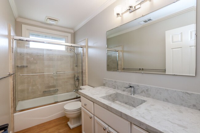 Building Photo - 4BR/3.5BA Belmont Home with Multiple Ensuite Bedrooms, A/C & 2-Car Garage | YouTube Tour