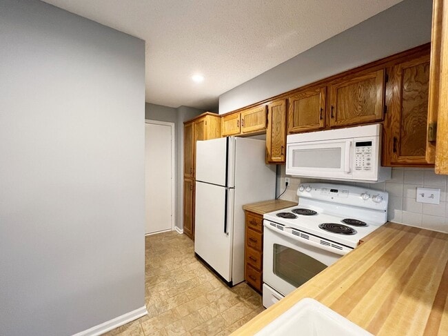 Building Photo - SEE IT NOW: Charming and Well-Maintained H...