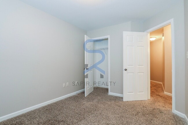 Building Photo - Move in before January 31st and choose your reward: a $250 Amazon Gift Card or a 55" Smart TV!