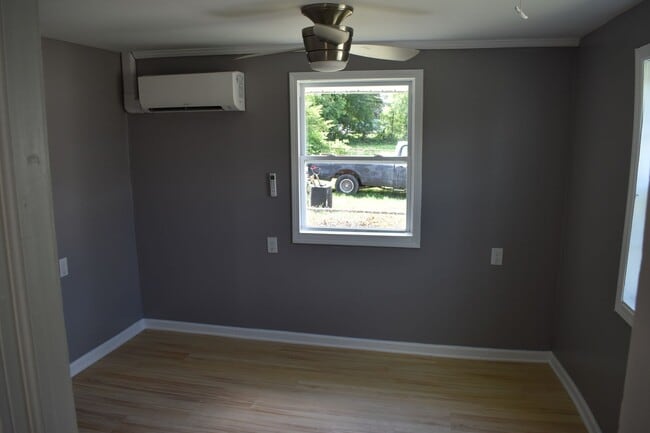Building Photo - One-Bedroom Apartment