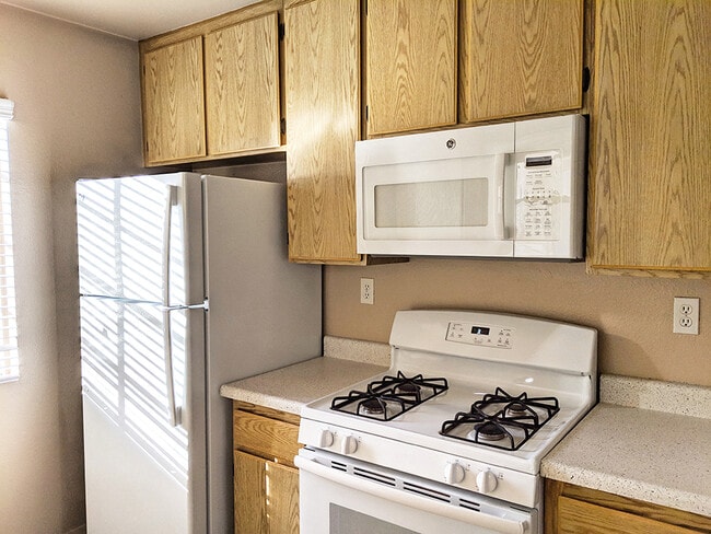 White GE appliances in kitchens - Westbrook Apartments
