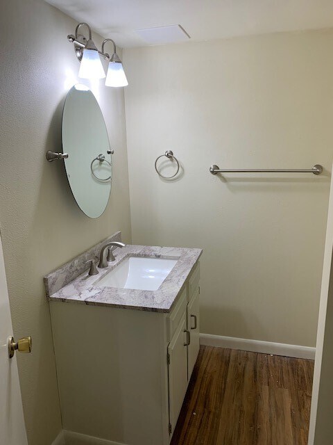 downstairs bathroom with shower - 2715 Sunnyview Ln