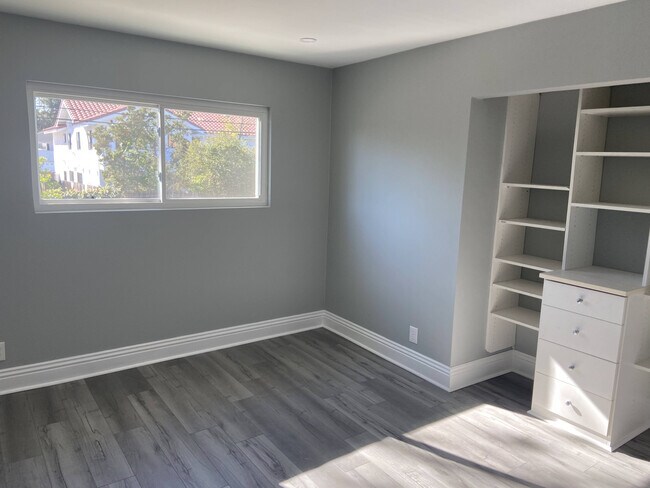 Bedroom #2 with closet with built in shelving - 24522 Blackfoot Dr