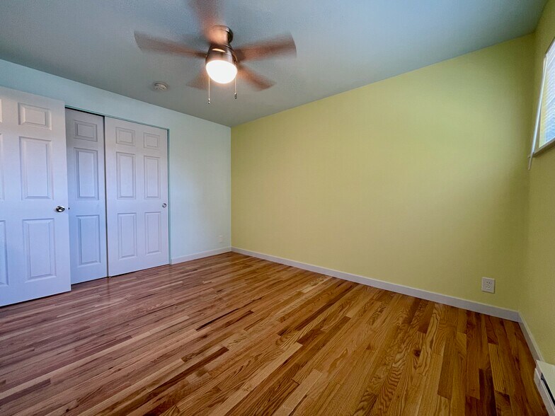 Spacious bedroom (picture is from similar apartment one floor up. Colors may vary) - 2801 14th Ave W