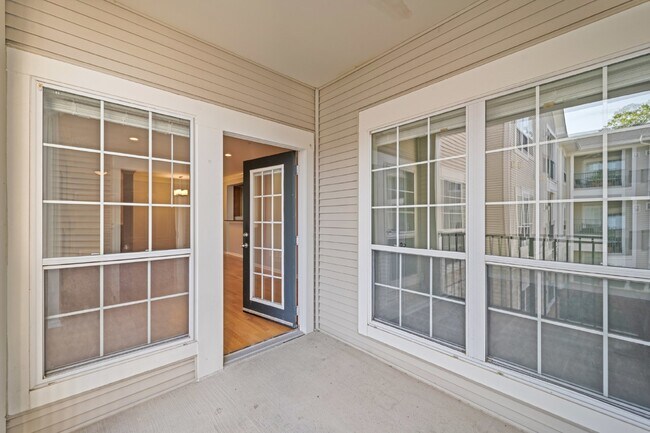 Building Photo - Two-bedroom, two-bathroom model with a den, located on the third floor.