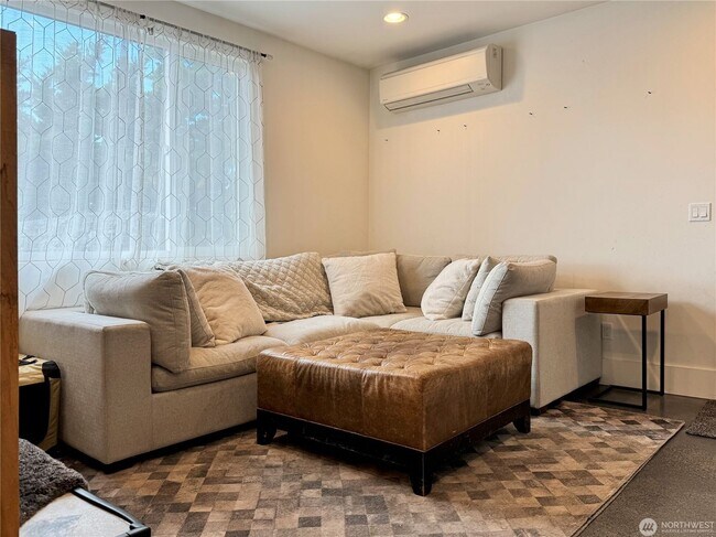 Building Photo - Remodeled 3 bdrm home on a large lot with 500 sq ft wrap around deck!