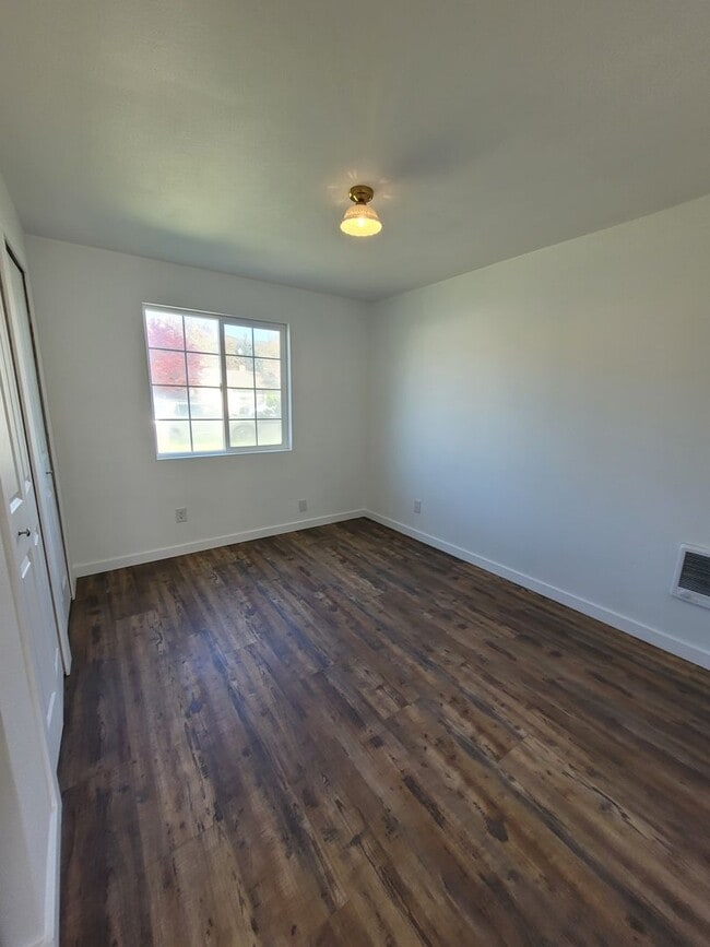 Building Photo - Free May rent with 1 Year Lease - Fully Remodeled with Garage & Yard Care Included