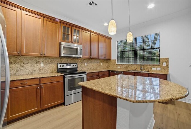 Building Photo - 13011 Riverwalk Cir N