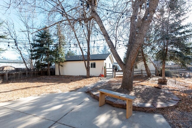 Building Photo - “PRICE DROP!!!” Live in the Heart of Old Town Lafayette | Spacious 4BR with Private Backyard & Ga...