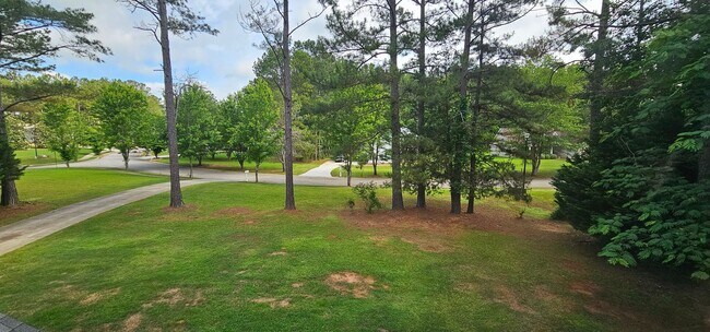 Building Photo - Commanding Curb Appeal, Conveniently Place