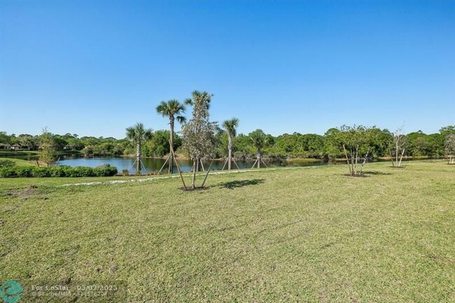 Building Photo - 9041 Dahlia Cir