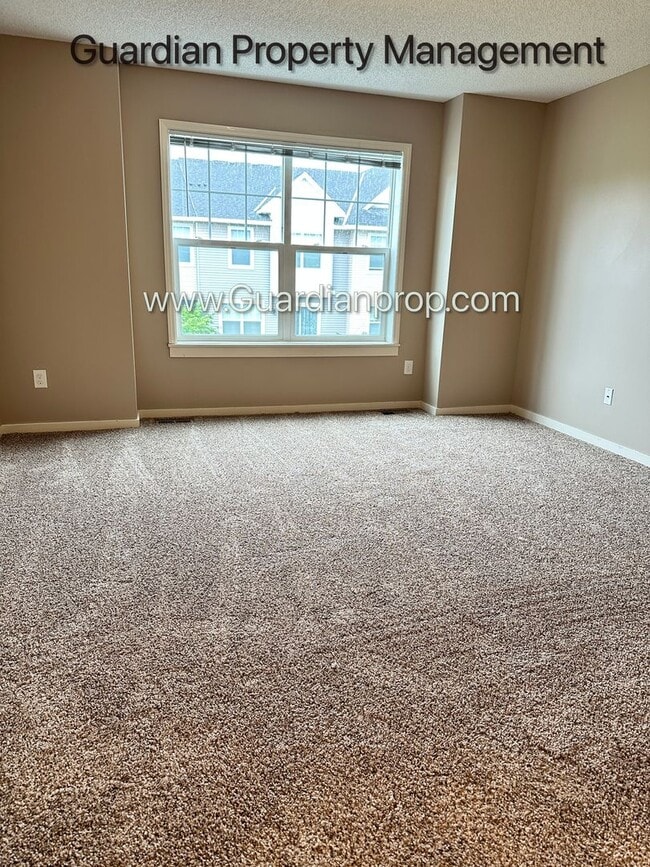 Building Photo - Champlin Town Home, 2 Car Garage, Dishwasher, Washer/Dryer, Balcony, July/Aug 1st Move In