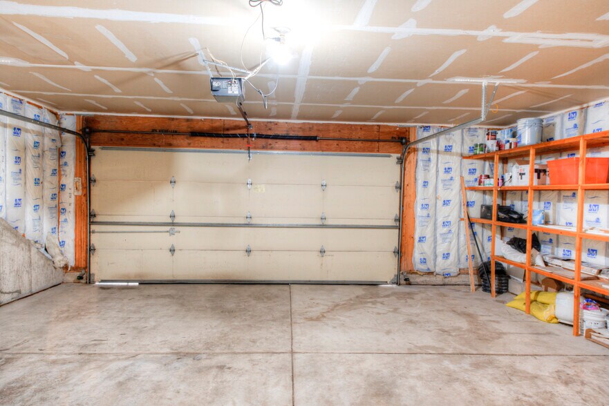 New garage door opener has two remotes. - 2875 Richmond Dr