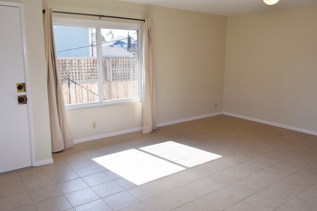 Building Photo - Upstairs 2BR/1BA North Park Apt with Assigned Parking and Laundry On-Site!