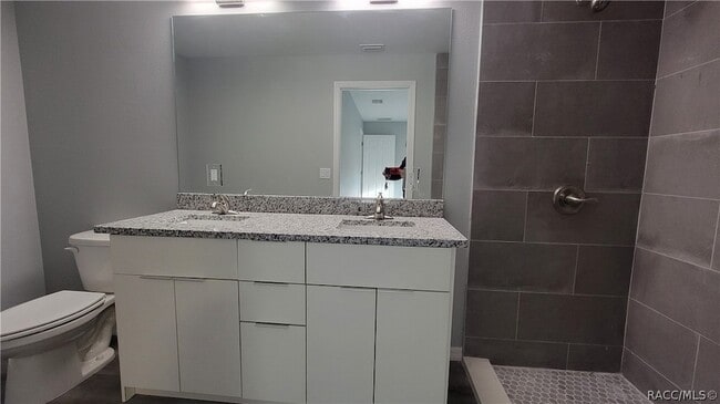 Building Photo - 7043 N Outrigger Terrace