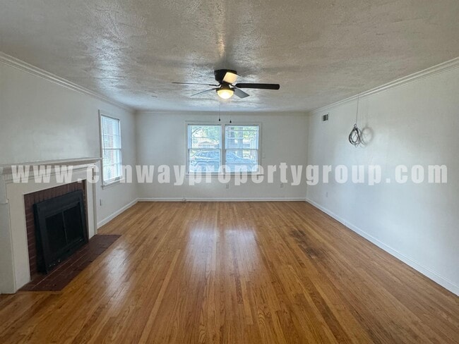 Building Photo - 718 S Donaghey Ave