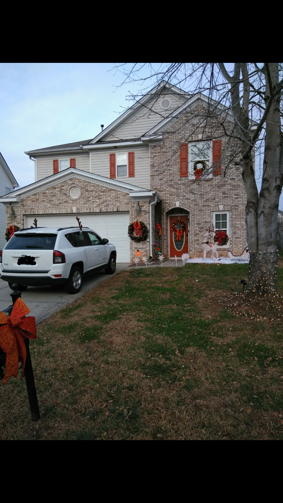 White speckled brick front, 2 car garage &amp; glass front door - 4345 Stone Mountain Drive