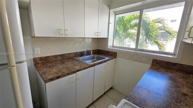 Building Photo - 7629 Dickens Ave