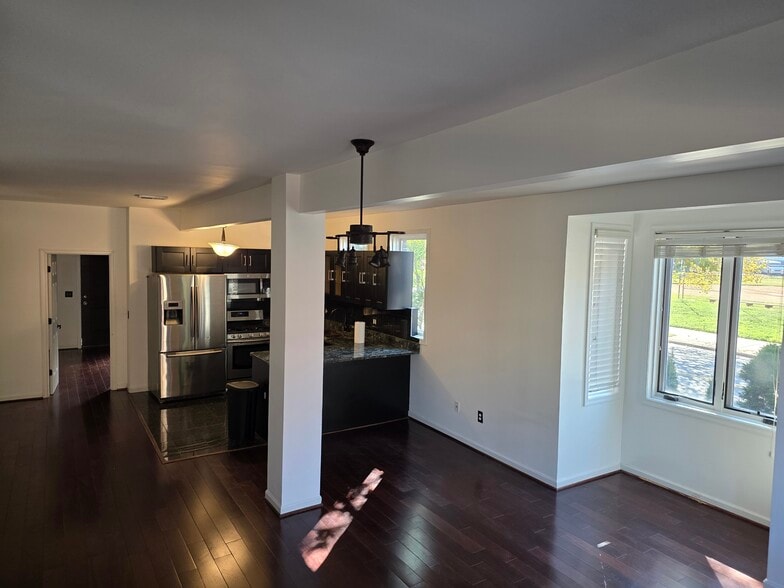 Kitchen and living room from entry. - 46 N St NW