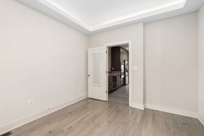 Building Photo - Experience stunning design and modern finishes in Columbia Heights!