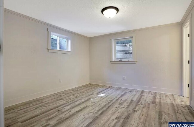 Building Photo - Available Now! 5 bedroom house with large yard and RV parking!