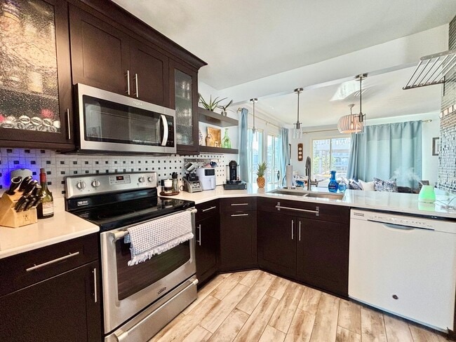 Building Photo - Stunning Virginia Beach Condo with Waterfr...