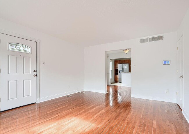 Building Photo - Updated End-of-Group Townhome with Finished Lower Level, Fenced Yard & Community Pool