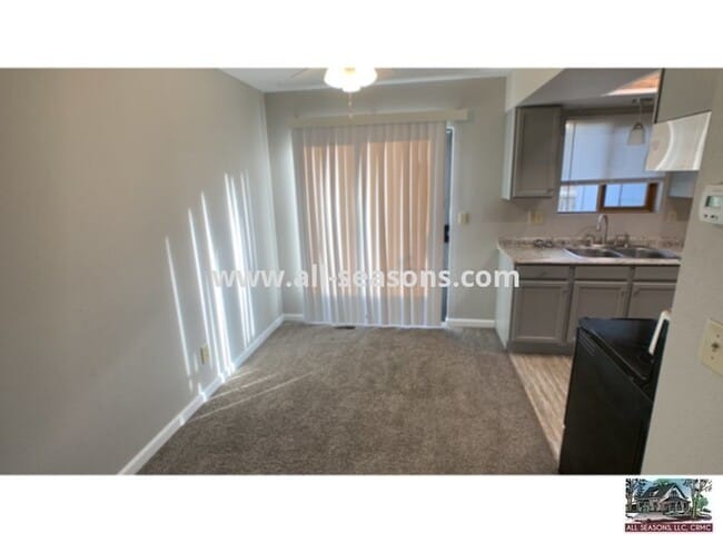 Building Photo - Located near Omaha and Powers, this fully ...