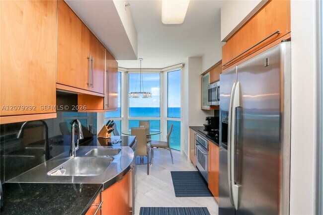 Building Photo - 6365 Collins Ave