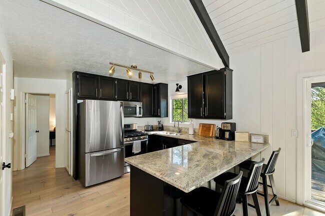 Building Photo - Stylish Chalet with Lake Rights