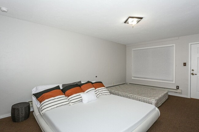 Building Photo - Walk to everything! Partially Furnished! Flexible lease terms!