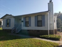Building Photo - 8026 Strawberry Point Dr