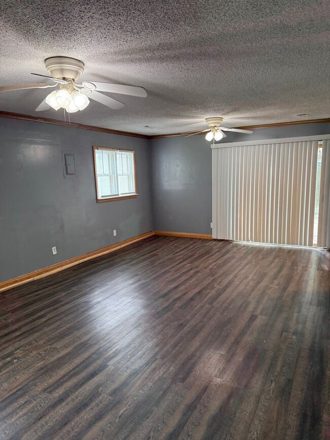 Building Photo - 3BR/1BA with overside detached garage read...