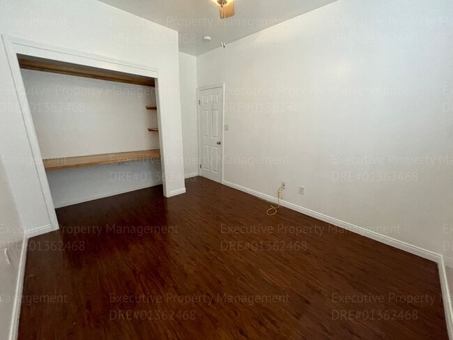 Building Photo - 4 bedrooms/ 2 bathrooms, with a patio.
