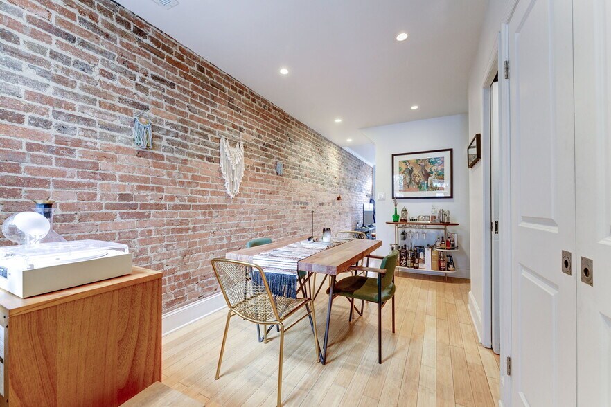 Exposed brick wall in Dining Room! - 602 14th Pl NE