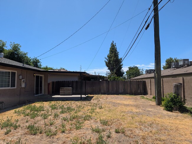 Building Photo - Updated home featuring a nice floor plan a...