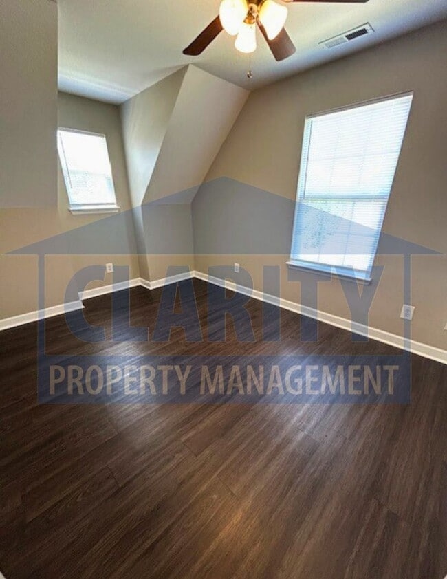 Building Photo - Charming three-bedroom home with carport!