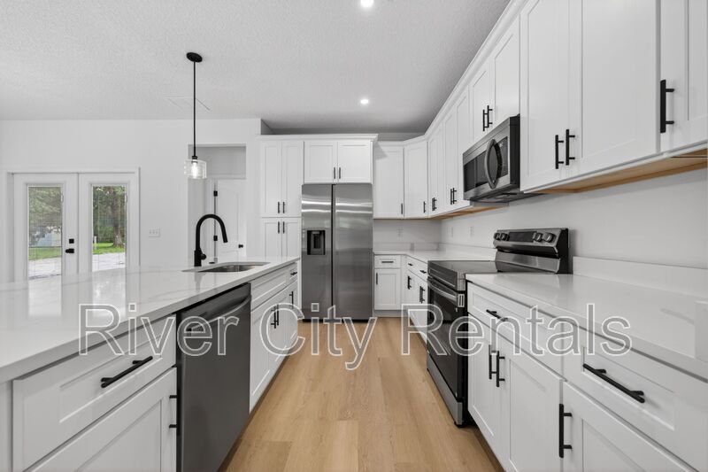 Building Photo - 9281 Dolphin St