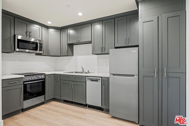 Building Photo - 1439 Armacost Ave